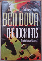 Bova, Ben. 'The Rock Rats: The Asteroid Wars: 2', published in 2002 by Hodder & Stoughton in hardback, with dustjacket, 440pp, ISBN 0340769580. Condition: Good, clean ex-library copy with some library markings; and a plastic cover protecting the exterior of the book. Price:&pound;3.50, not including p&p, which is Amazon's standard charge (currently &pound;2.75 for UK buyers, more for overseas customers)